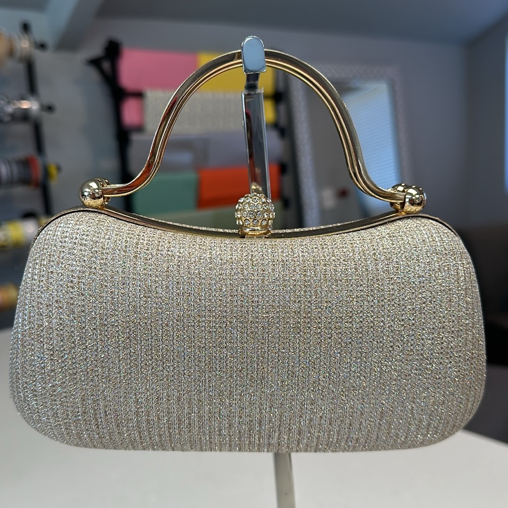 Elegant Gold Clutch with Rhinestone Accent